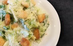 Order Caesar Salad food online from Round Table Pizza store, Salinas on bringmethat.com